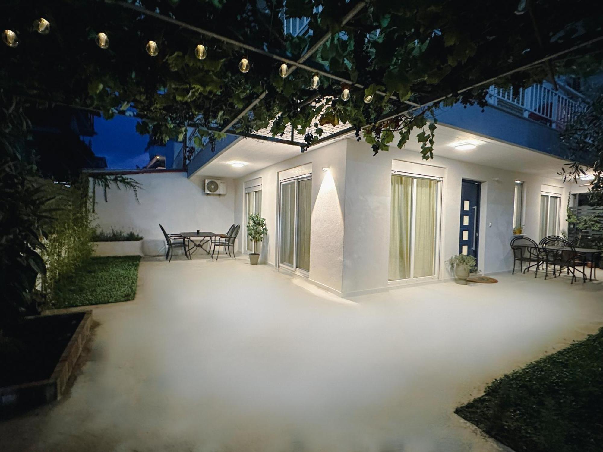 Modern Seaside Retreat With Private Patio And Parking Holiday home Olympiaki Akti